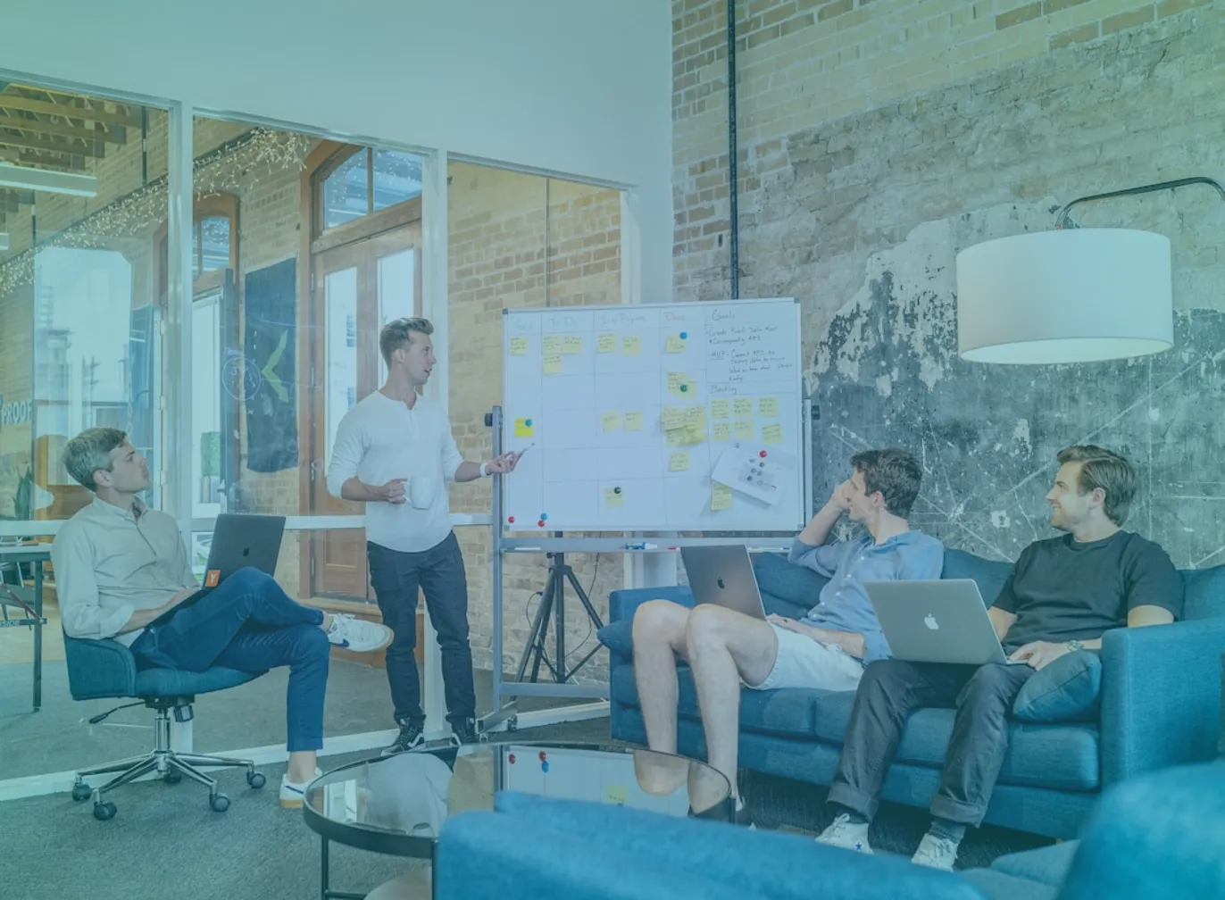 what-is-abm-marketing-featured-1 Business team strategy session at whiteboard